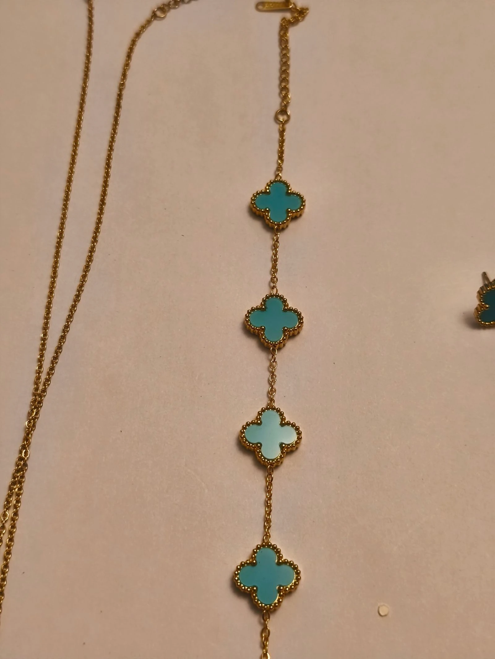 Conjunto de gargantilha pulseira e brincos de trevo cor turquesa – photo 11